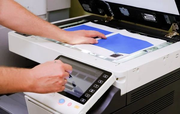 A man is scanning the document — Stock Photo, Image