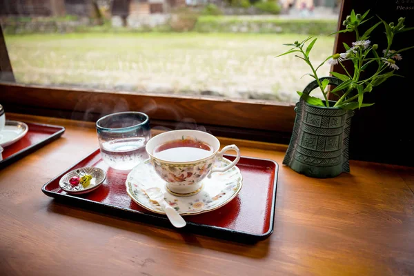 Elegant Tea Cup Tea Water Some Sweets Served Wooden Tray — Stock Photo, Image