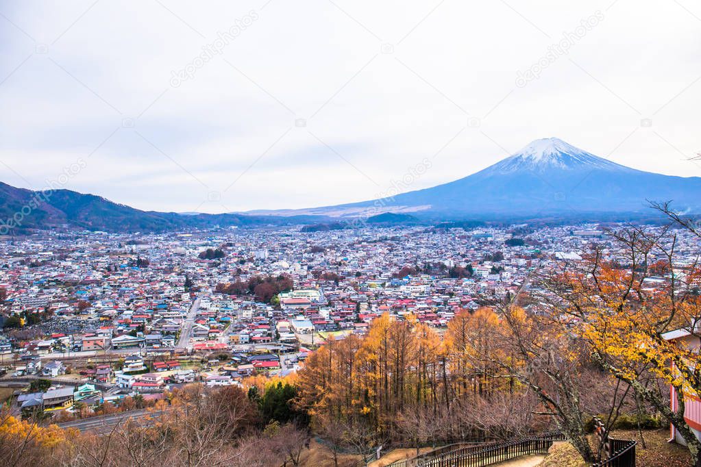 Autumn scene of Mount Fuji and Fujiyoshida city from Arakurayama sengen park, Yamanashi, Japan.
