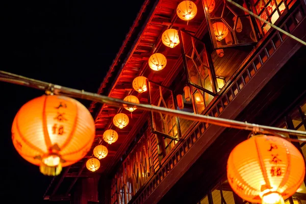 Red lanterns in the narrow alleys of the small town of Jiufen