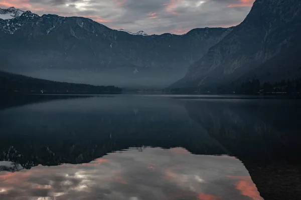 Bohinj, beautiful foggy lake in the alps