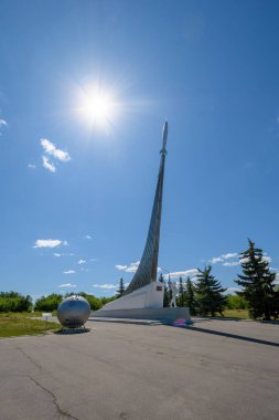 SMELOVKA, SARATOV, RUSSIA - JULY 2019: Place of landing of the first cosmonaut Yuri Gagarin. Stella and Monument. Lander spacecraft. clipart