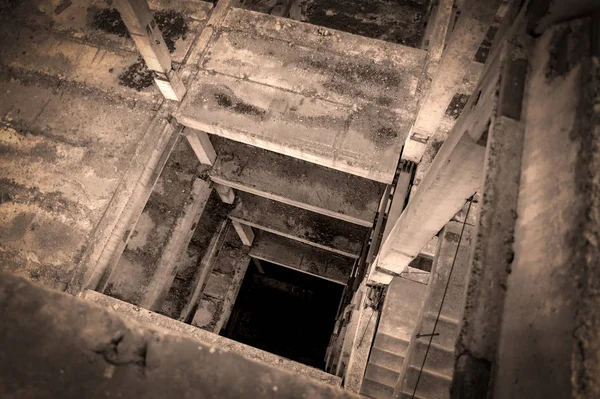 depositphotos_271796280-stock-photo-staircase-unfinished-building-abandoned-concrete.jpg
