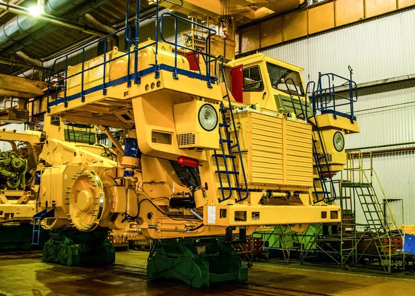 Plant for the production of career heavy dump trucks Belaz. Belaz is a Belarusian manufacturer of haulage and earthmoving equipment, dump trucks, haul trucks, heavy equipment. Close-up
