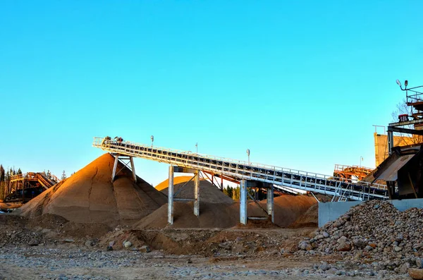 Mining quarry for the production of crushed stone, sand and gravel for use in construction. Crushing plants, machines and equipment for crushing, grinding stone, sorting sand and bulk materials