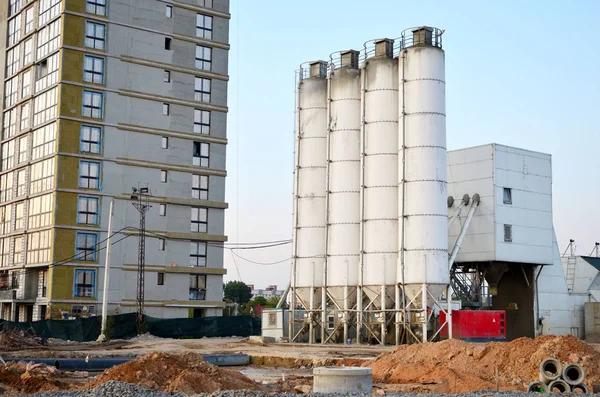Stationary concrete batching plant on construction site. Producing oncrete for construction and portland cement mortar