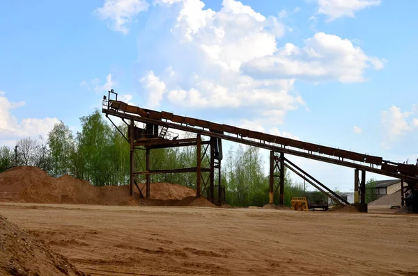 Sand making plant in mining quarry. Crushing factory with production line for crushing, grinding stone, sorting sand and bulk materials. Sand washing for the construction industry
