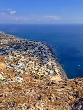 Santorini Adası'nda günbatımı, Kamari üzerinde Antik Thera açısından