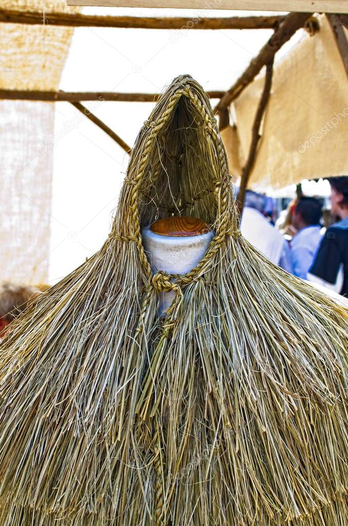 Traditional straw raincoat, at Feira Franca Pontevedra