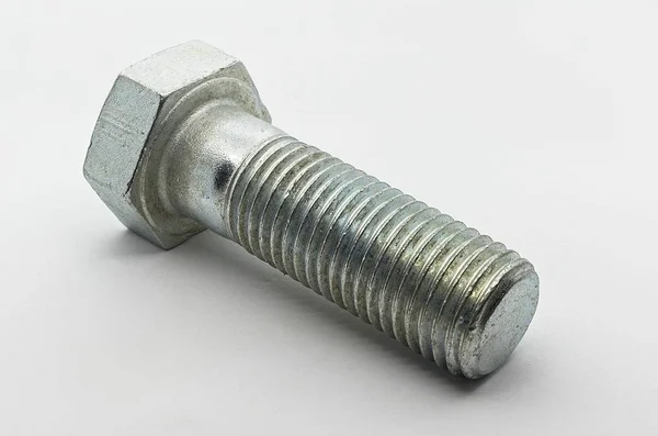 白色背景上的钢螺母 螺栓和夹紧器 — 图库照片