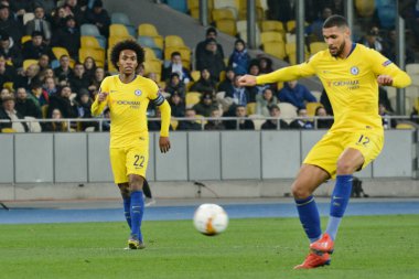 Kiev, Ukrayna - 14 Mart 2019: Ruben Loftus-Cheek (R) ve Chelsea Fc Dinamo Kiev Kiev, Ukrayna Milli Güvenlik Olimpiyskyi Stadyumu'nda karşı Şampiyonlar Ligi Oyun sırasında Willian (L). Chelsea 5-0 kazandı 