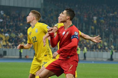 Kyiv, Ukrayna - 14 Ekim 2019: Portekizli Cristiano Ronaldo (C) Ukrayna ve Portekiz arasında oynanan Avrupa ön eleme maçında Kyiv 'deki Olimpiyat Stadyumu' nda