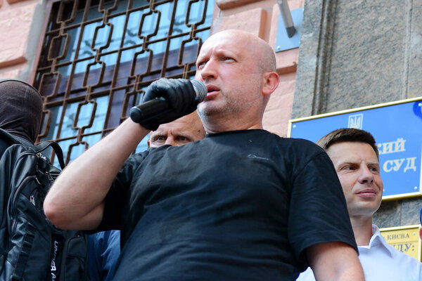 KYIV, UKRAINE - 1 JULY 2020: Oleksandr Turchynov speaks into the microphone outside the Pechersk district court which will choose measures of restraint for Petro Poroshenko in the case of designation of Serhii Semochko to a post of Deputy Head of the