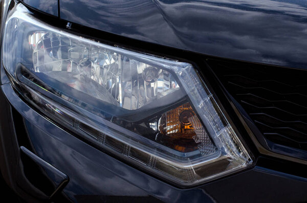 Car headlight close-up
