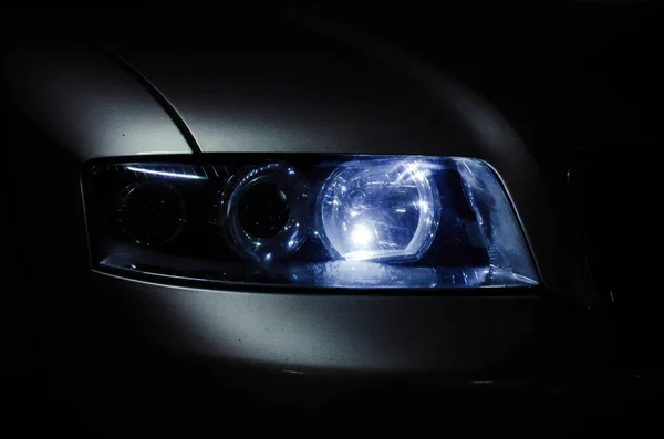 Headlight of the car with the included lamps