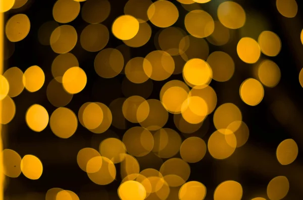 Beautiful golden bokeh for black — Stock Photo, Image