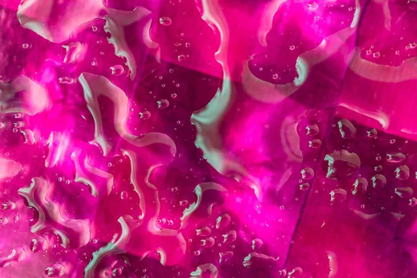 Pink Abstract Background. Water Drops On Glass And Pink Background. Amazing Abstract Water Drops On Glass Texture Or Background