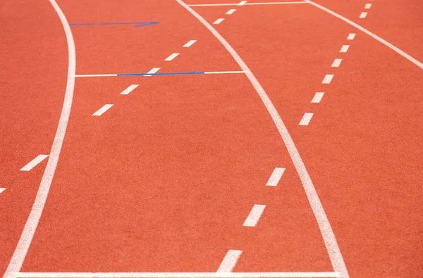 Running Track In A Sports Stadium. Autumn Scene