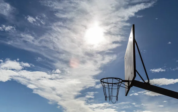Basketball Wooden Board With Iron Nets. Outside Basketball Court With Beautiful Autumn Sky