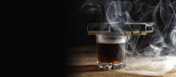 Electronic Cigarette Lying Glass Whiskey Shrouded Steam — Stock Photo, Image