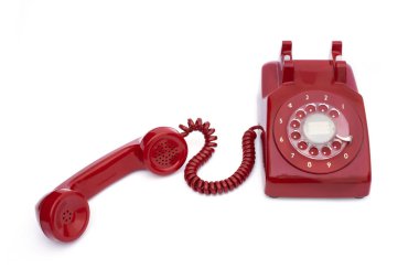 İzole beyaz arka planda retro sabit kırmızı telefon
