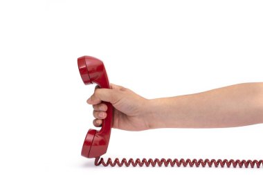 İzole beyaz arka planda retro sabit kırmızı telefon