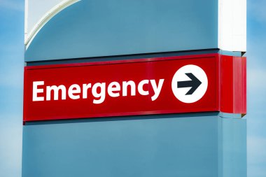 Close-up horizontal shot of an Emergency Room Sign. clipart