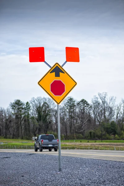 Road Sign Warning Of New Stop Sign Ahead Stock Photo