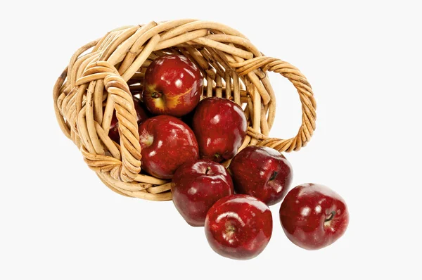 Small Basket With Red Apples Spilling Out Isolated — Stock Photo, Image