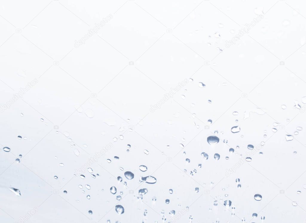 Drops of water on a light background for design