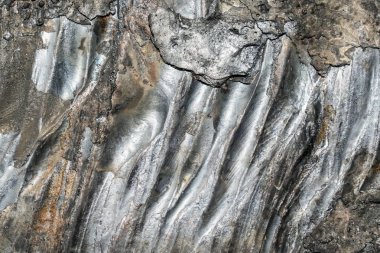 Otojen kaynak makinesi tasarım arka plan için kesilmiş kalın metal bir parça