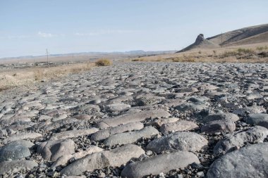 Eski yol tasarım arka plan için taşlarla kaplı