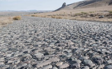 Eski yol tasarım arka plan için taşlarla kaplı