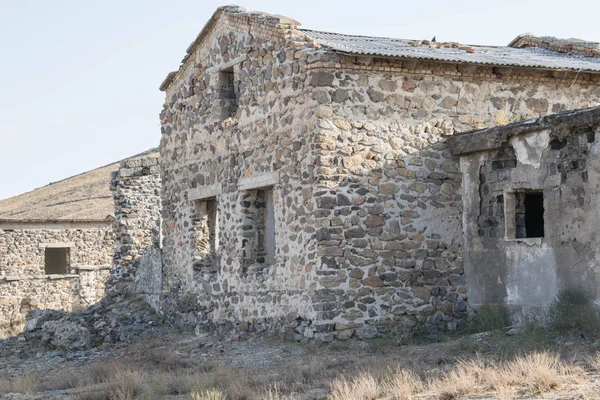 old building abandoned house ruins without windows without doors for design background