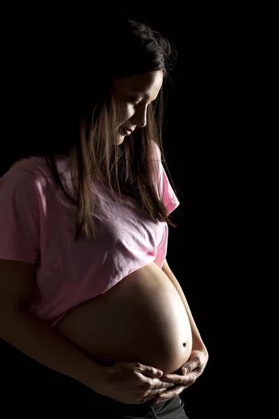 Silhouette Una Bella Donna Incinta Uno Sfondo Nero — Foto Stock