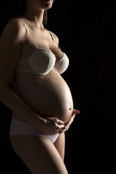 Silhuetten Ung Gravid Kvinna Vita Underkläder Svart Bakgrund — Stockfoto