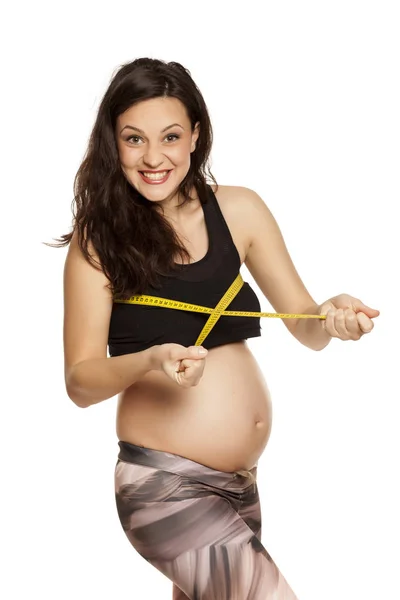 Happy Pregnant Woman Measuring Her Breasts White Background — Stock Photo, Image