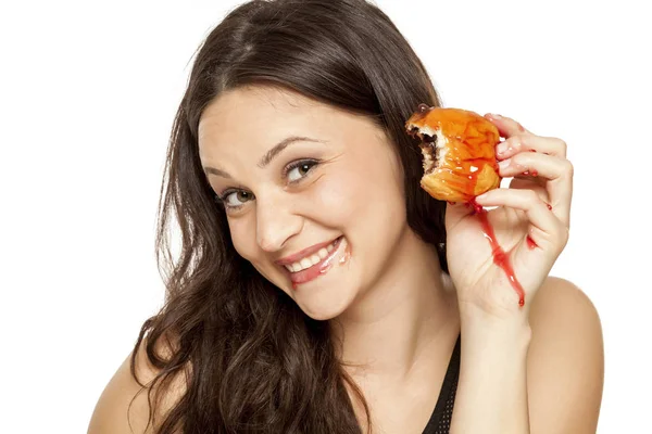 Desejando Jovem Mulher Comer Uma Cereja Cobertura Donut Fundo Branco — Fotografia de Stock