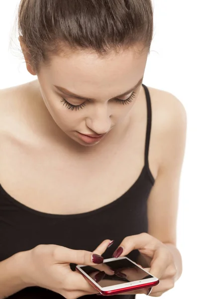 Young Woman Texting Her Smartphone White Background — Stock Photo, Image