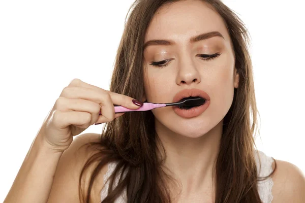 Young Woman Brushing Her Teeth Black Tooth Paste Active Charcoal — Stock Photo, Image