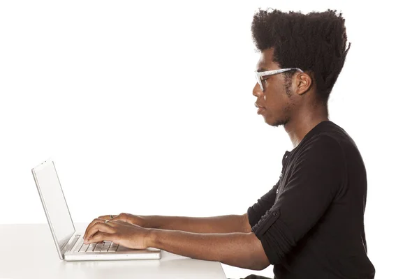 Young African American Guy Working Desk Laptop White Background — Stock Photo, Image