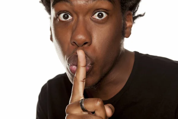 Young Handsome Afro American Hipster Guy Finger His Lips Isolated — Stock Photo, Image