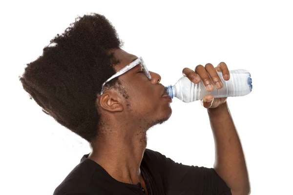 Portrait Young African American Man Drinking Water Plastic Bottle White — Stock Photo, Image