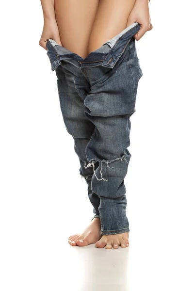 Young Woman Trying Put Her Tight Jeans White Background — Stock Photo, Image