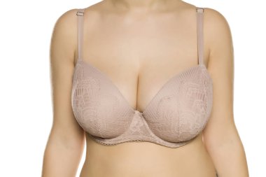 Beyaz arka planda sütyen güzel büyük göğüsler