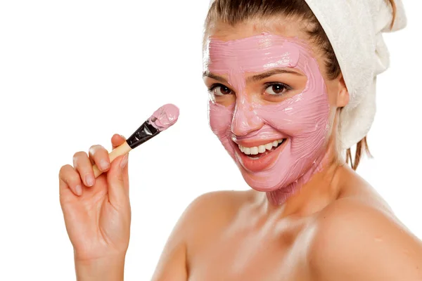 Young Smiling Woman Posing Facial Mask Her Face Towel Her — Stock Photo, Image
