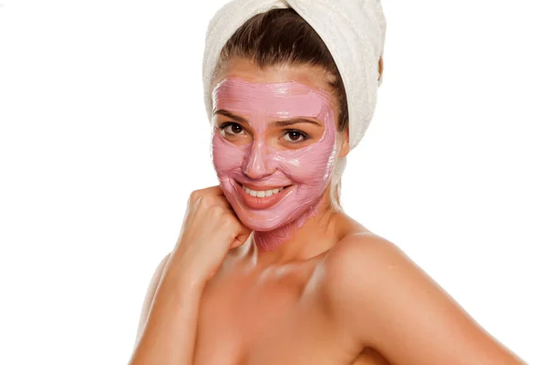 Young Smiling Woman Posing Facial Mask Her Face Towel Her — Stock Photo, Image