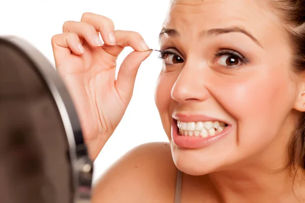 Young Woman Unstick Pull Out Her False Eyelashes White Background — Stock Photo, Image