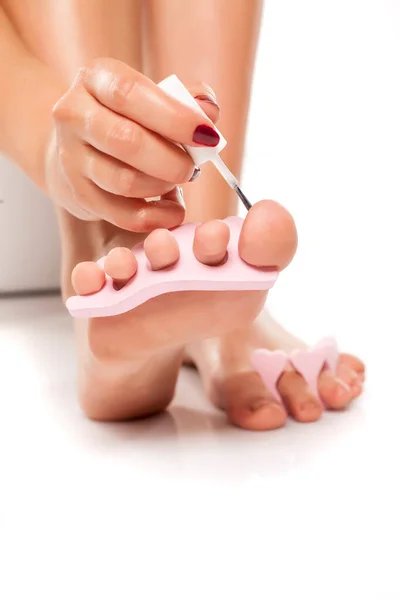 Woman Polishing Her Toenails Nail Polish Separator White Background — Stock Photo, Image