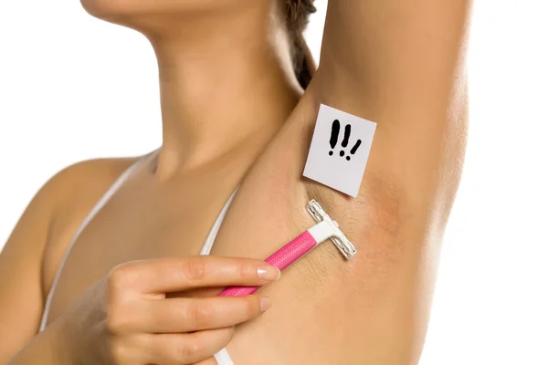 Woman Shaves Her Underarm Exclamation Mark Her White Background — Stock Photo, Image